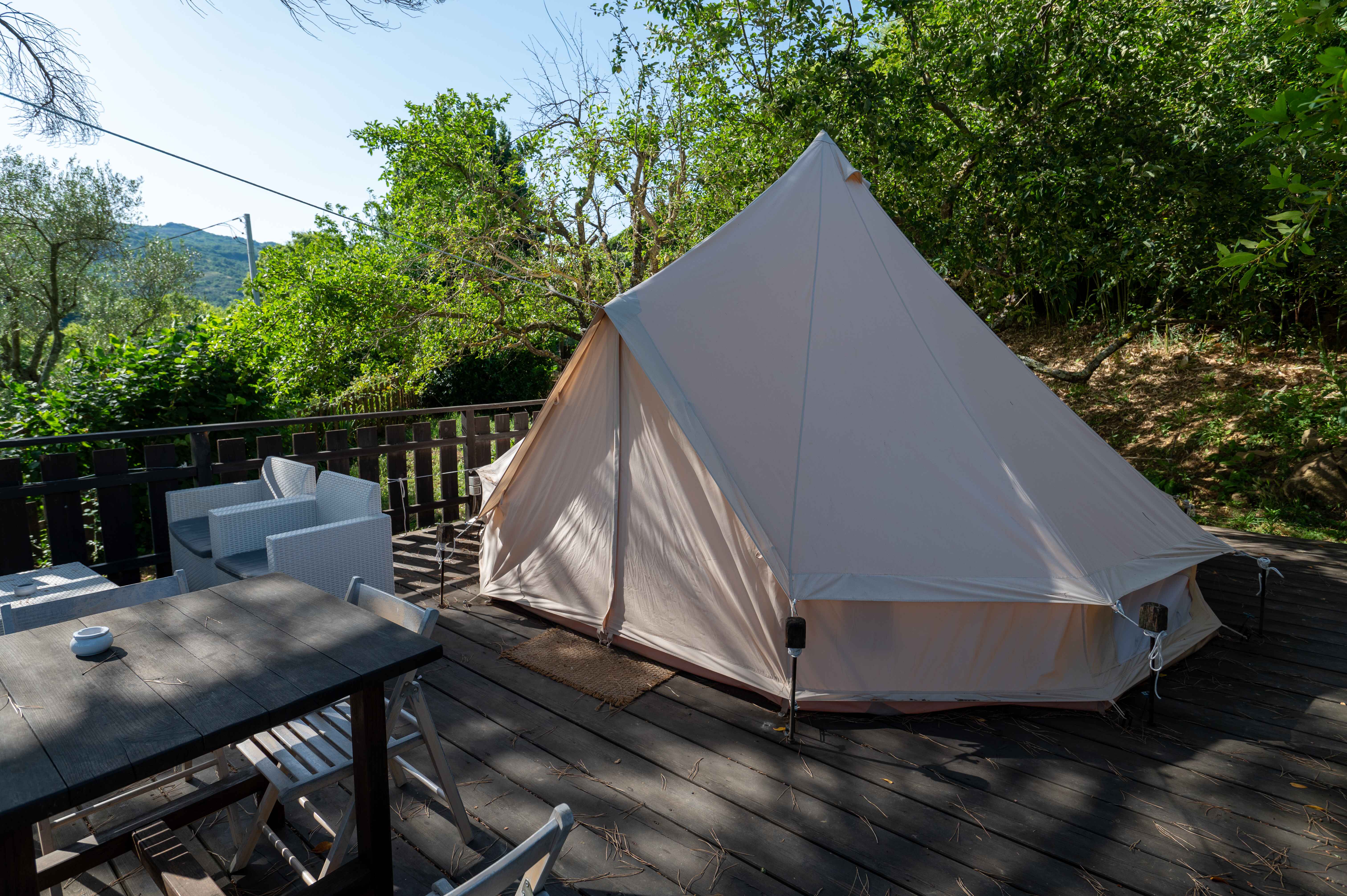 A glamping tent in a dream landscape