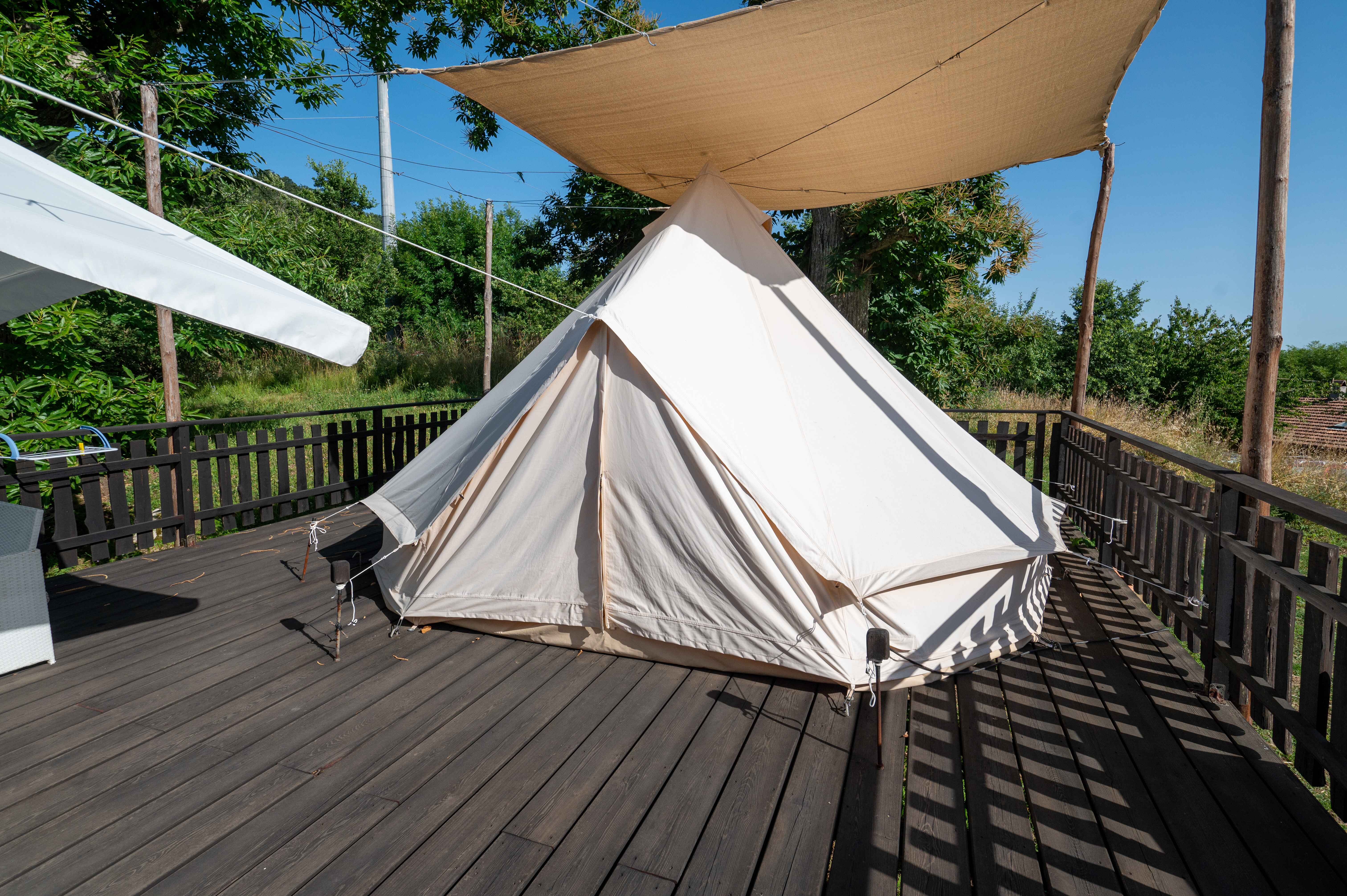 A glamping tent in a dream landscape