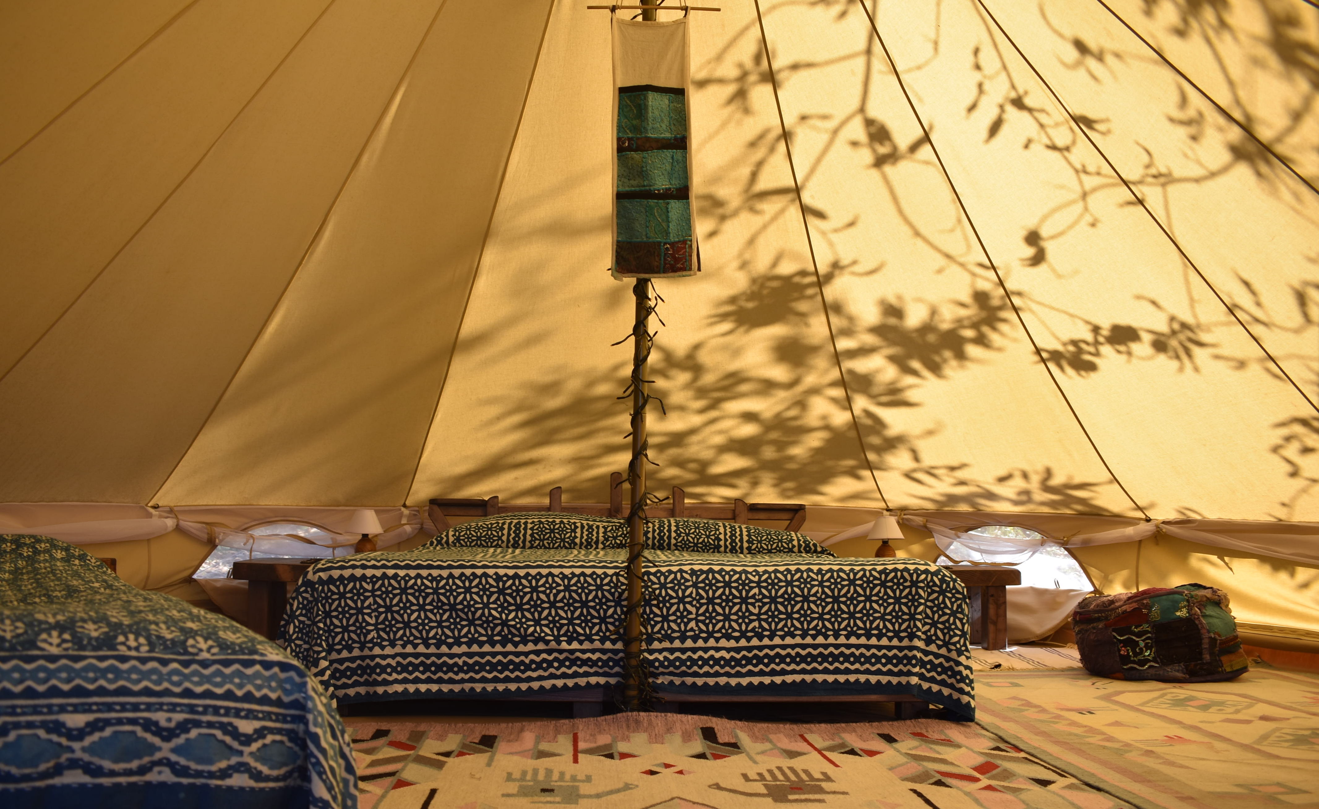 A glamping tent in a dream landscape